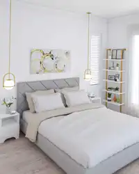 Bright bedroom with white furniture photo