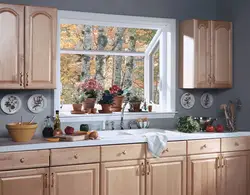Kitchen where the window is in the interior