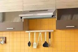 Extractor hood in kitchen set photo