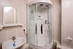 Бұрыштық кабинасы бар ванна бөлмесінің дизайны