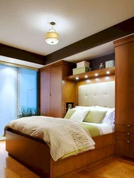 Bedroom design with double bed and wardrobe