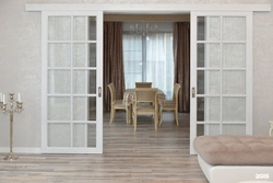 Sliding doors to the living room in the interior photo