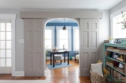 Sliding doors to the living room in the interior photo