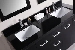 Bathroom with black sink photo