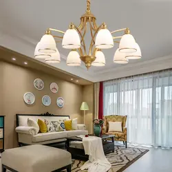 Chandeliers and lamps in the living room interior photo