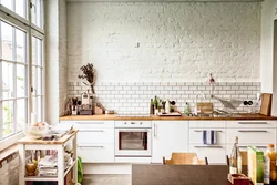 White kitchen in the interior photo with what wallpaper