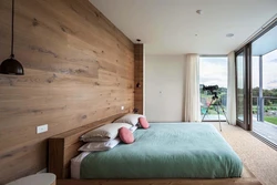 Bedroom Interior With Wooden Wall Photo