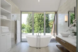 Bathroom with floor-to-ceiling windows photo