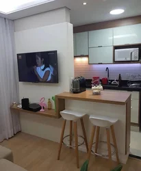 Kitchen partition in a studio apartment photo