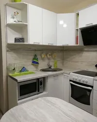 Small kitchen design with refrigerator