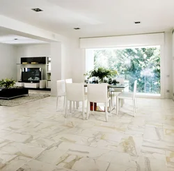 White porcelain stoneware floor in the interior of the kitchen living room