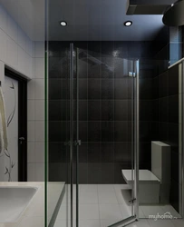 Duş fotoşəkili ilə qara və ağ vanna otağı
