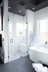 Black and white bathroom with shower photo