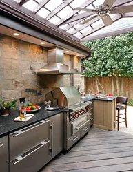 Kitchen in the country with barbecue photo