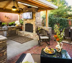 Kitchen in the country with barbecue photo