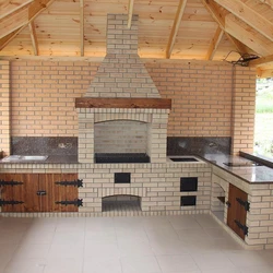 Kitchen In The Country With Barbecue Photo
