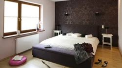 Bedroom interior with brown wallpaper and furniture