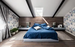 Bedroom Design In The Attic With A Sloping Ceiling