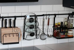 Kitchen railing with hooks photo