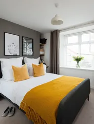 Gray yellow bedroom interior