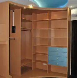 Corner built-in wardrobe in the bedroom inside photo