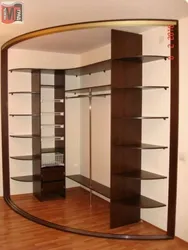 Угловой встроенный шкаф в спальню внутри фото