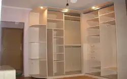 Corner built-in wardrobe in the bedroom inside photo