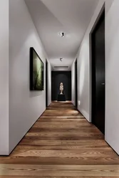 What color is the floor in the hallway photo