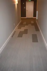 What color is the floor in the hallway photo