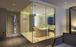 Bath design with glass partition