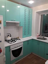 Kitchen design 8m2 with refrigerator photo