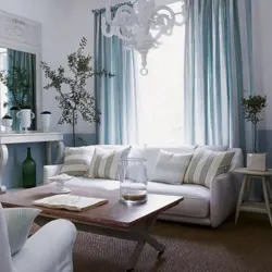 Gray walls in the living room interior, what kind of curtains photo