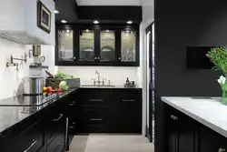 Dark small kitchen photo