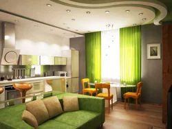 Green kitchen in the interior with living room design