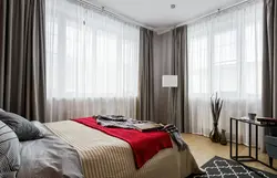 Bedroom with two windows on one wall design photo