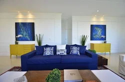 Bedroom with blue sofa design