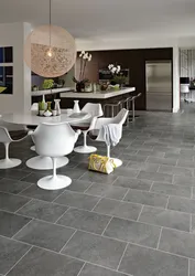 Gray tiles on the kitchen floor photo