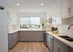 Combination of white gray and beige in the kitchen interior