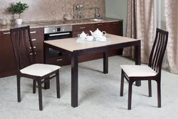 Kitchen design with brown table and chairs