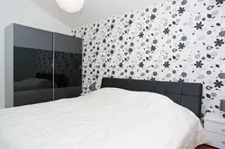 Interior in the bedroom if the wallpaper is black and white