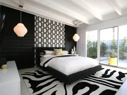 Interior in the bedroom if the wallpaper is black and white