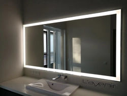 Bathroom mirror with lighting in the bathroom interior