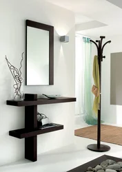 Wall mirror for hallway with shelf photo