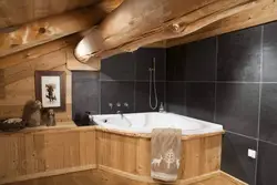 Interior Of A Bathroom In A Wooden House Made Of Logs