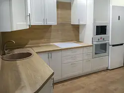 Wooden Table In The Kitchen Interior