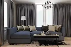Curtains under gray walls in the living room interior