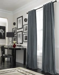 Curtains Under Gray Walls In The Living Room Interior