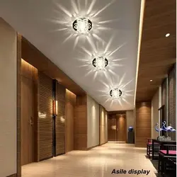 Lamps on a suspended ceiling in the hallway interior photo