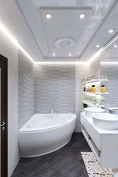 Bathroom design with a corner bathtub in light colors