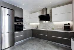 Photo Of A Gray Kitchen Combined With White